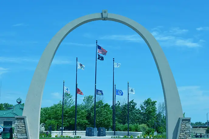 Veterans Memorial Park arch in Carol Stream, IL, representing Swan Primary Care.